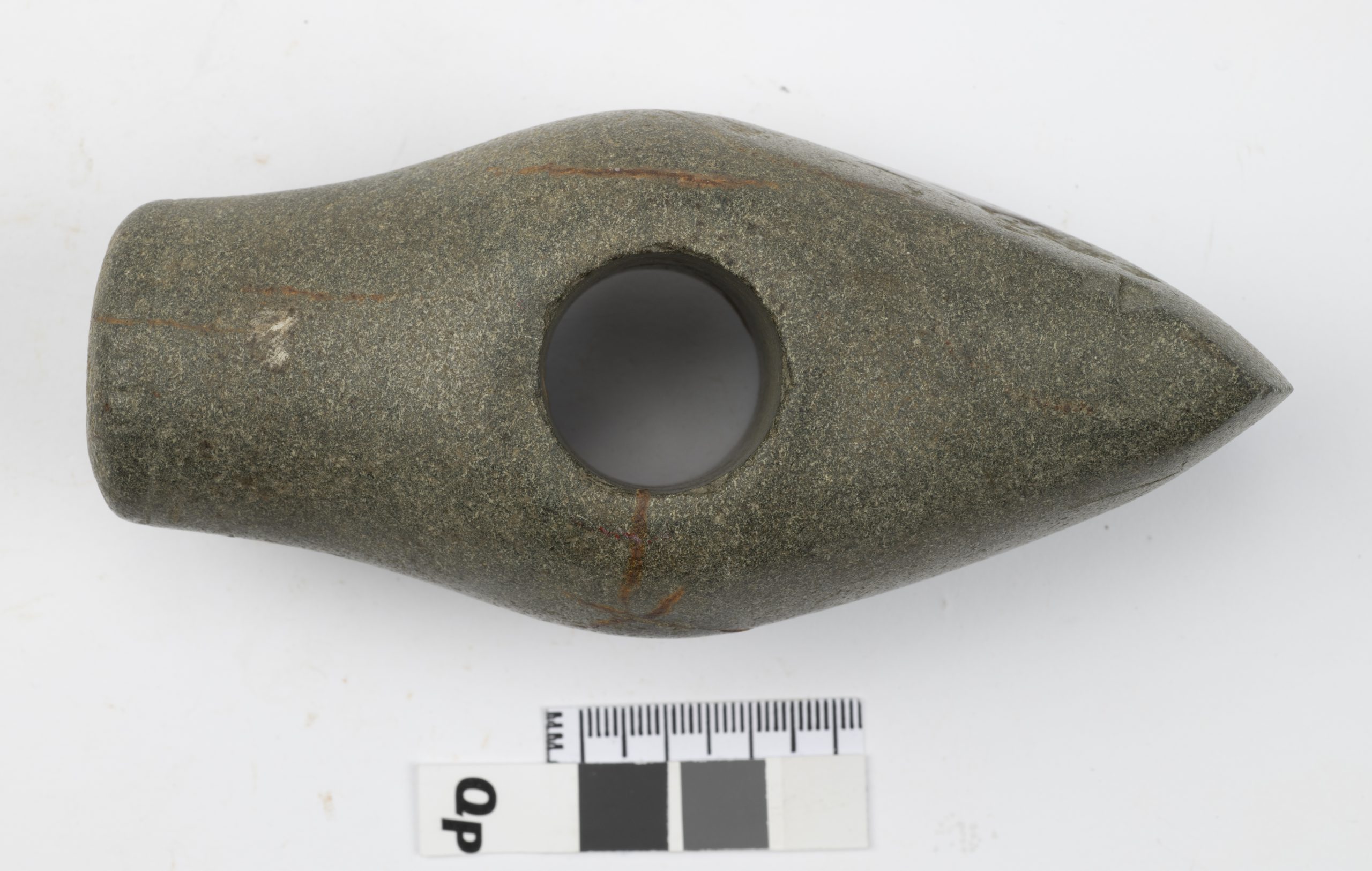 A stone axe with a smooth surface, a central hole for the handle, and tapered ends.