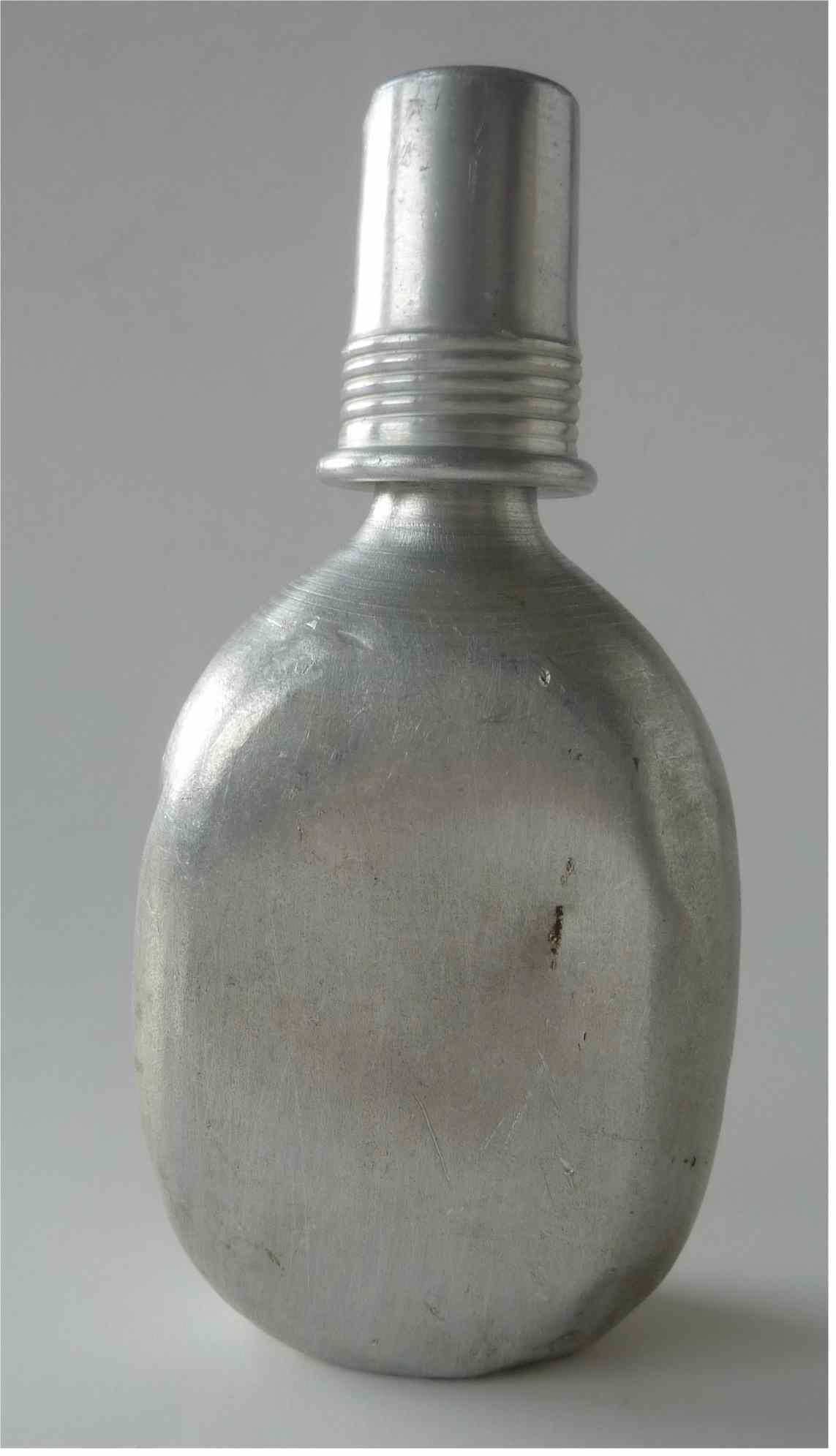 A metal canteen with a simple, rounded shape.