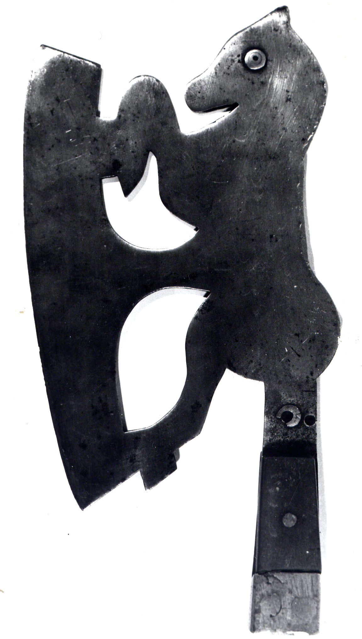 Iron cleaver with a horse-shaped blade.