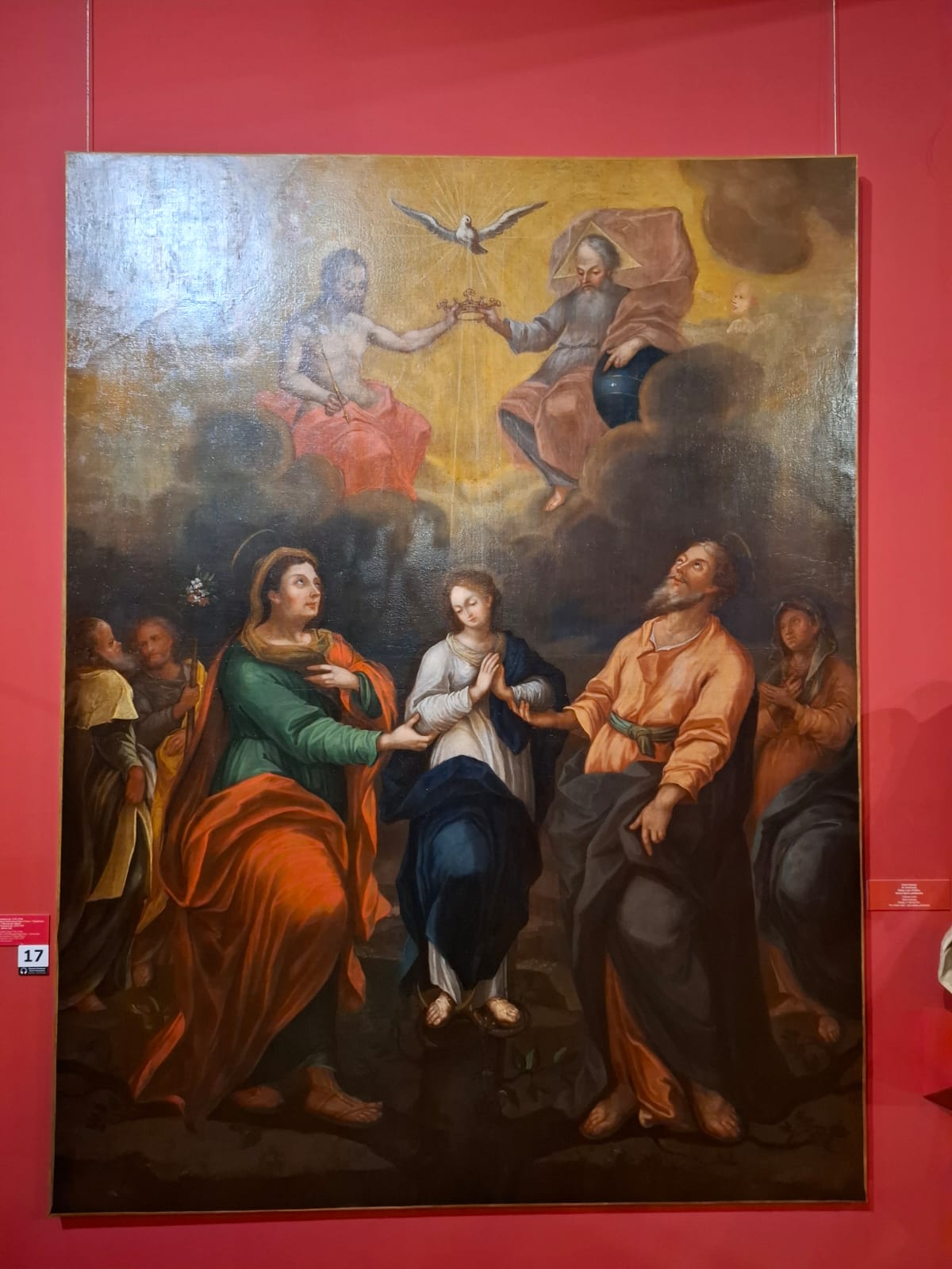 Obraz religijny przedstawiający koronację Maryi przez Trójcę Świętą, z postaciami świętych poniżej.